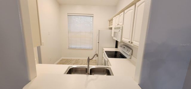 2860 OSPREY COVE PLACE 202, Kissimmee, FL 34746