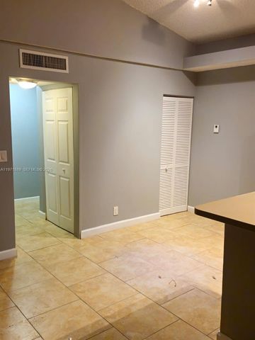 701 Lyons Rd 13205, Coconut Creek, FL 33063