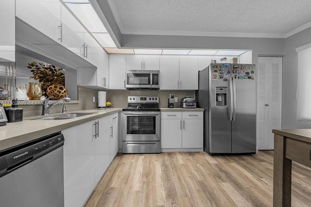 12850 SW 4th Ct 306I, Pembroke Pines, FL 33027