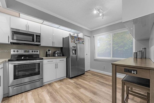 12850 SW 4th Ct 306I, Pembroke Pines, FL 33027