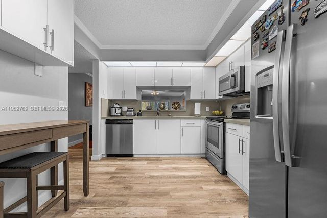 12850 SW 4th Ct 306I, Pembroke Pines, FL 33027