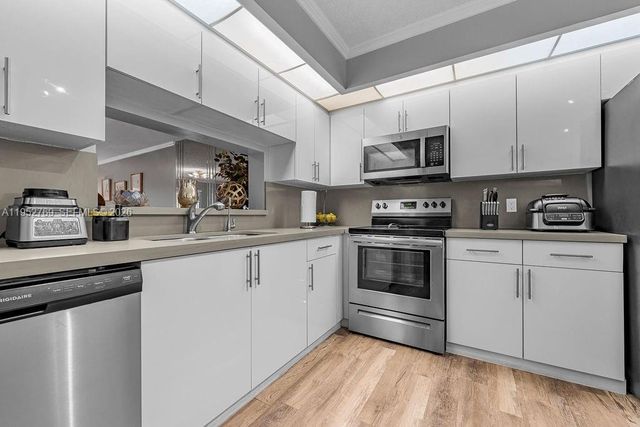 12850 SW 4th Ct 306I, Pembroke Pines, FL 33027