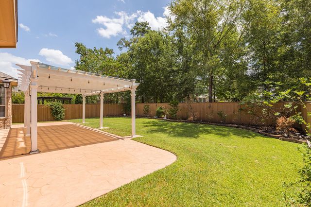 27 N Arrow Canyon Circle, The Woodlands, TX 77389