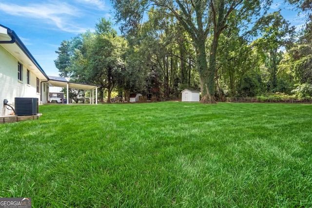 385 Greenwood Drive NW, Lilburn, GA 30047