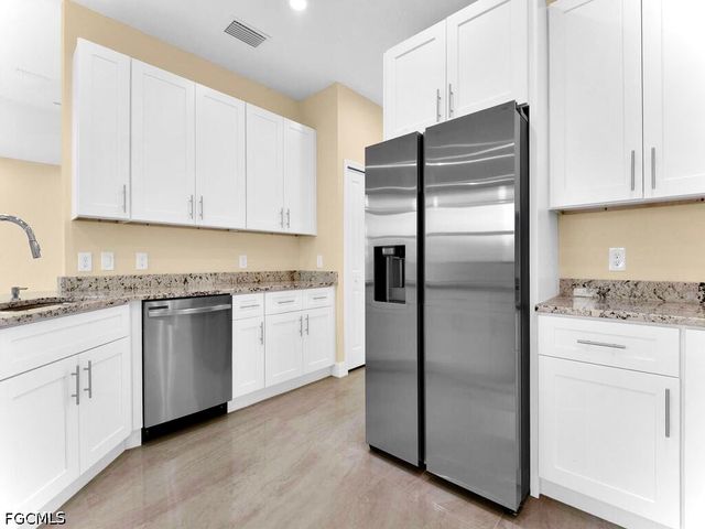 637 Cardinal ST E, Lehigh Acres, FL 33974