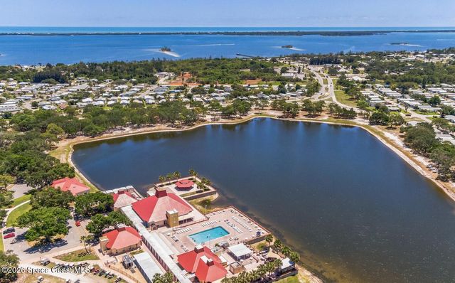 1027 Oriole Circle, Barefoot Bay, FL 32976