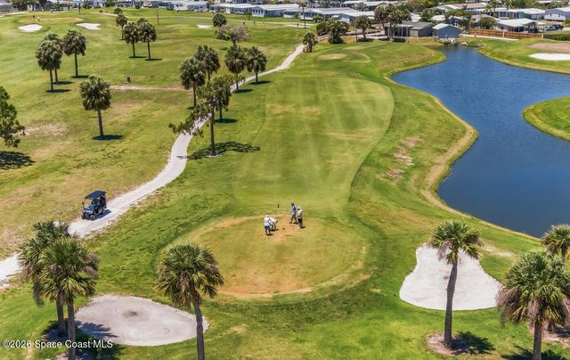 1027 Oriole Circle, Barefoot Bay, FL 32976