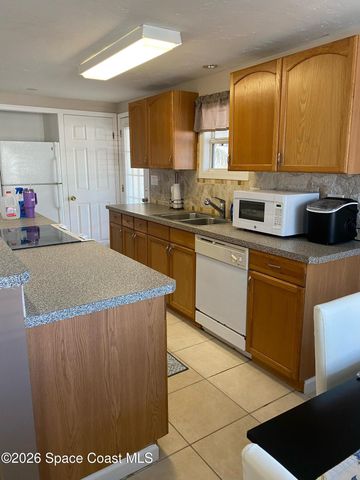 1027 Oriole Circle, Barefoot Bay, FL 32976