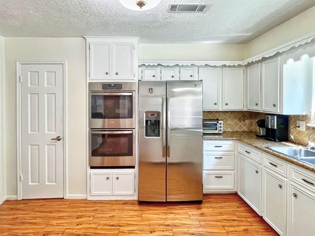 16902 Summit Oaks Lane, Spring, TX 77379