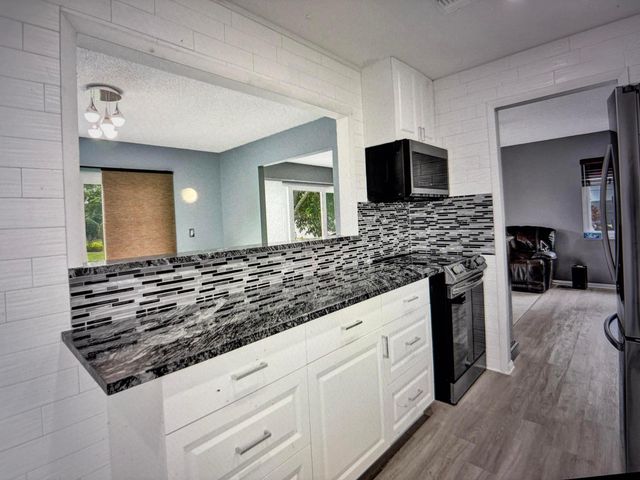 6309 Silver Moon Lane, Greenacres, FL 33463