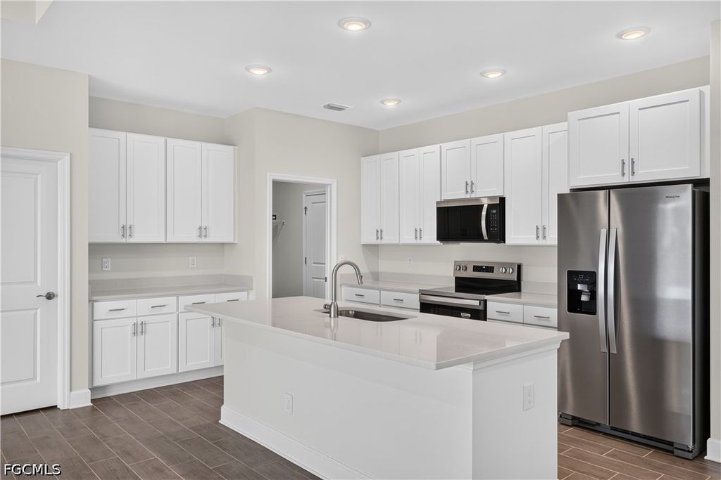 Image 9 of property listing at 1911 NW 1st PL, Cape Coral, FL 33993