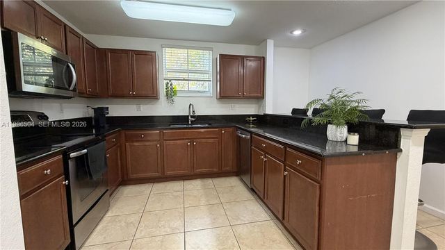 11605 NW 89th St 220, Doral, FL 33178