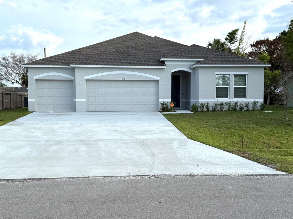1070 SW Versailles Avenue, Port St. Lucie, FL 34953