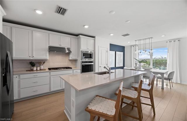 616 Oasis Lake PL, Lehigh Acres, FL 33936