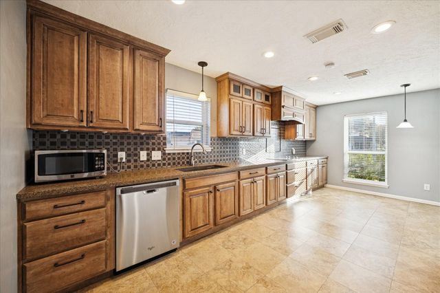 11302 Brook Meadows Lane, Meadows Place, TX 77477