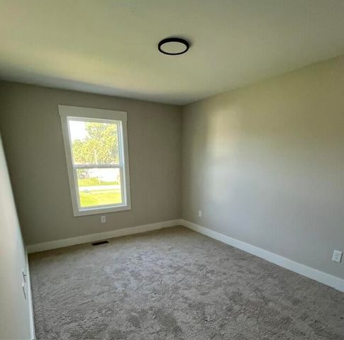 671 Waterford Village Drive, Grand Rapids, MI 49534