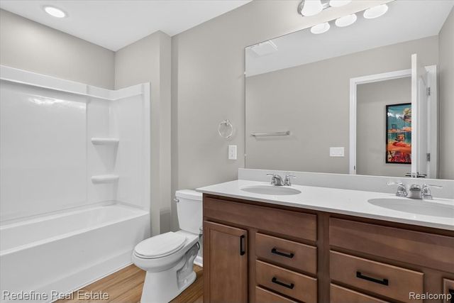 59564 Schuss Gully Drive, New Hudson, MI 48165