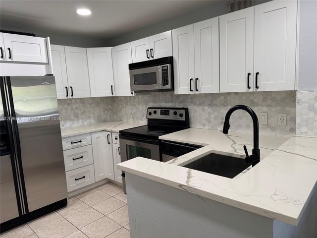 1825 Palm Cove Boulevard 7-303, Delray Beach, FL 33445
