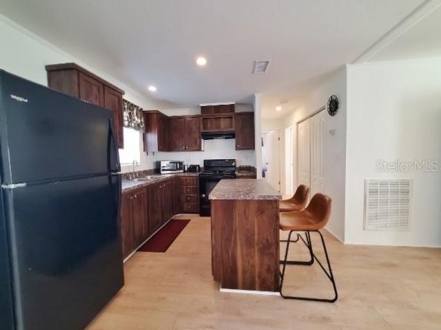 12116 SW COUNTY RD. 769 ROAD 73, Lake Suzy, FL 34269