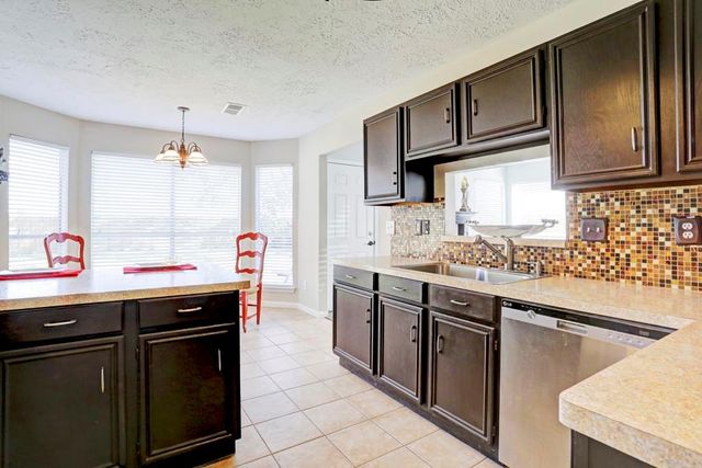 21702 N Tangle Creek Lane, Spring, TX 77388