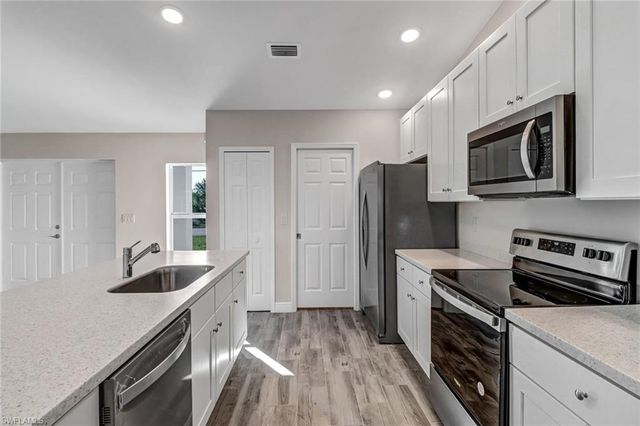 1121 Jacaranda PKWY E, Cape Coral, FL 33909