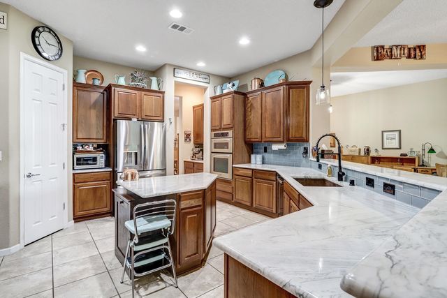 25 Los Balcones Place NE, Rio Rancho, NM 87124