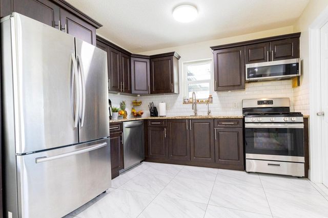 5763 Purdy Lane, West Palm Beach, FL 33415