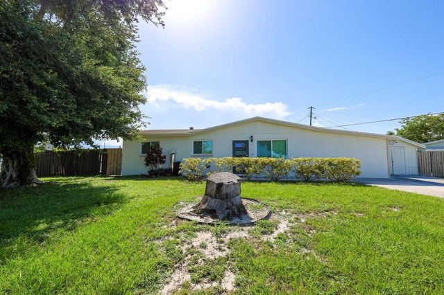 5763 Purdy Lane, West Palm Beach, FL 33415
