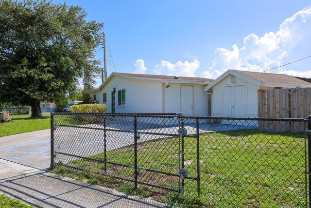 5763 Purdy Lane, West Palm Beach, FL 33415