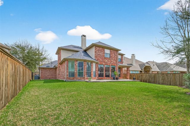 35 Woodmoor Place, Magnolia, TX 77354