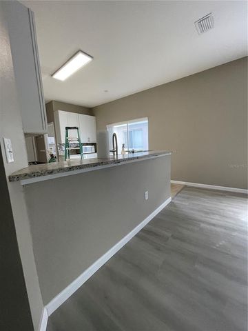 4939 WOODMERE ROAD, Land O Lakes, FL 34639