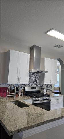 4939 WOODMERE ROAD, Land O Lakes, FL 34639