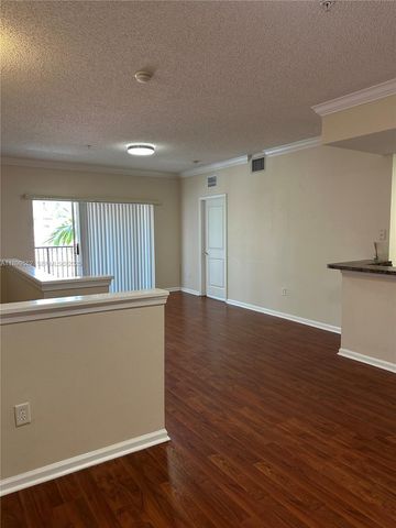 5840 W Sample Road 306, Coral Springs, FL 33067