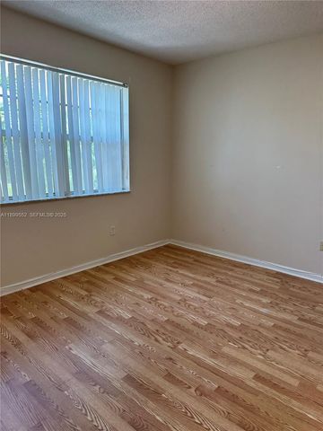 5840 W Sample Road 306, Coral Springs, FL 33067