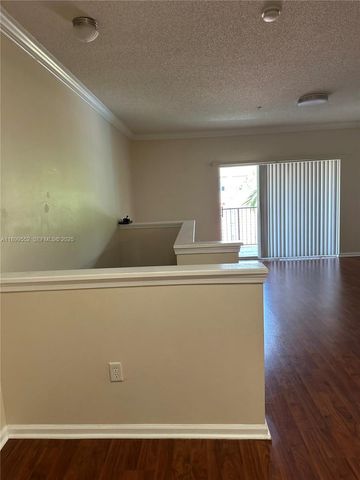 5840 W Sample Road 306, Coral Springs, FL 33067