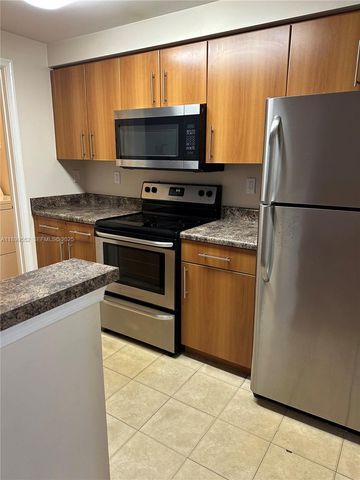 5840 W Sample Road 306, Coral Springs, FL 33067