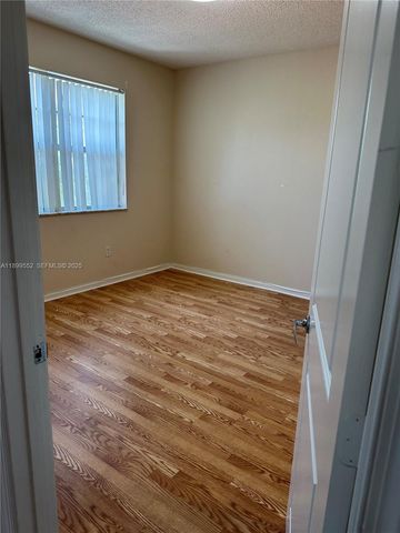 5840 W Sample Road 306, Coral Springs, FL 33067