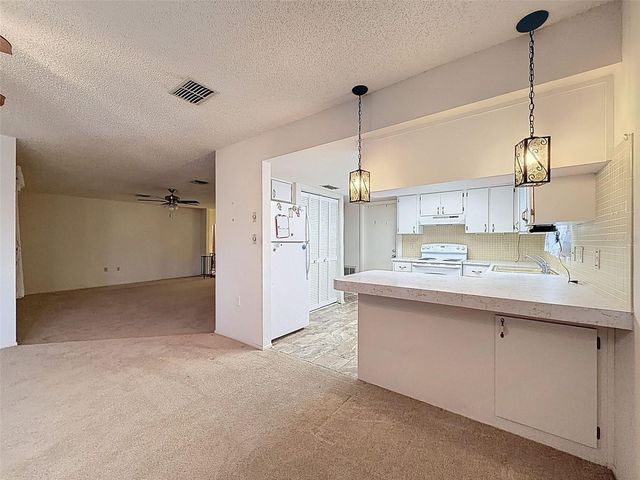 9811 WOODSTOCK LANE, Port Richey, FL 34668