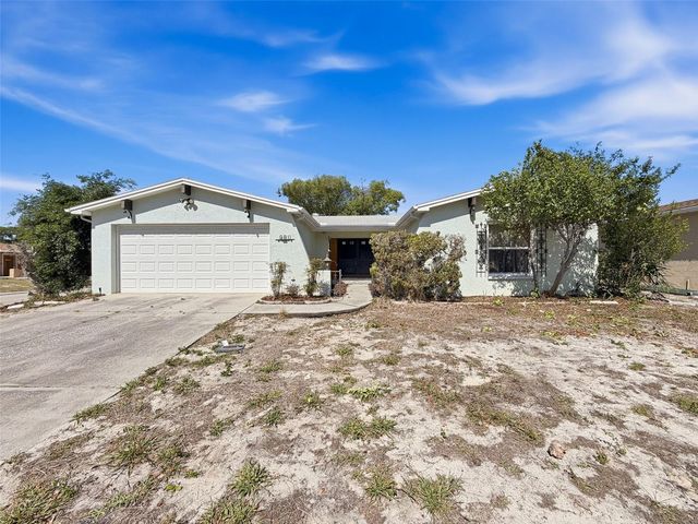9811 WOODSTOCK LANE, Port Richey, FL 34668