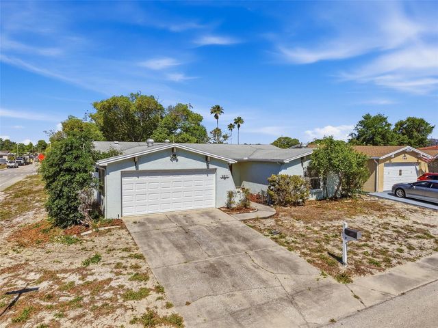 9811 WOODSTOCK LANE, Port Richey, FL 34668