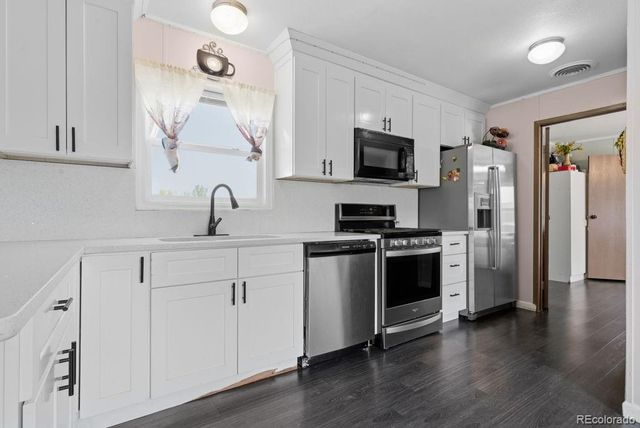 15814 colfax ave, Aurora, CO 80011