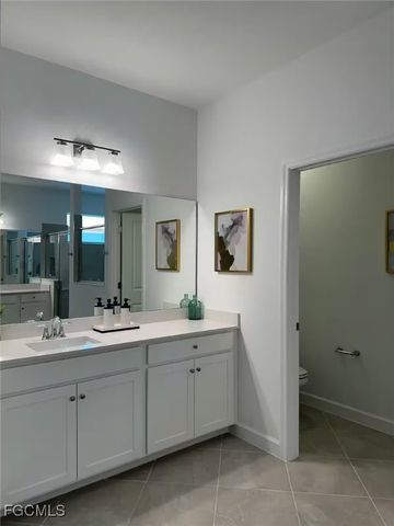 9291 Aqua Overlook CT, Lehigh Acres, FL 33936