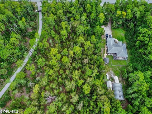 5040 CHERRY WOOD DR, Naples, FL 34119