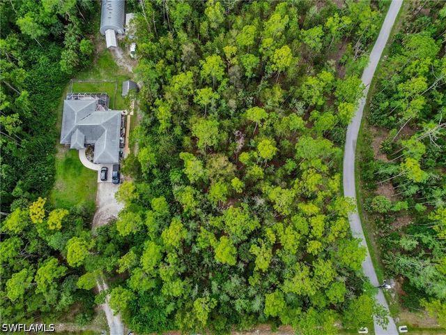 5040 CHERRY WOOD DR, Naples, FL 34119