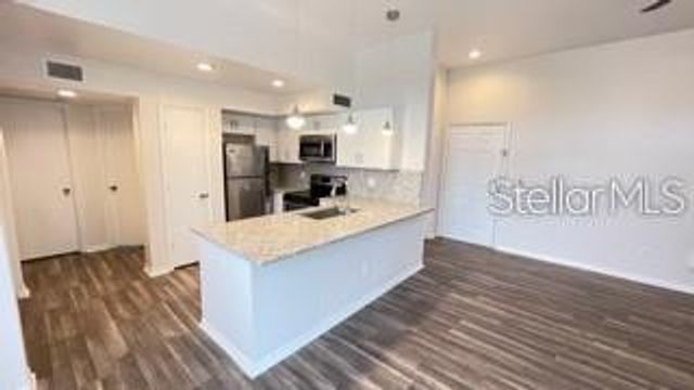 7270 WESTPOINTE BOULEVARD 933, Orlando, FL 32835