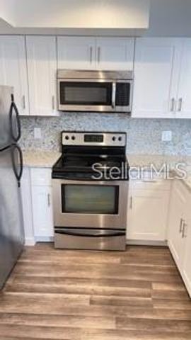 7270 WESTPOINTE BOULEVARD 933, Orlando, FL 32835