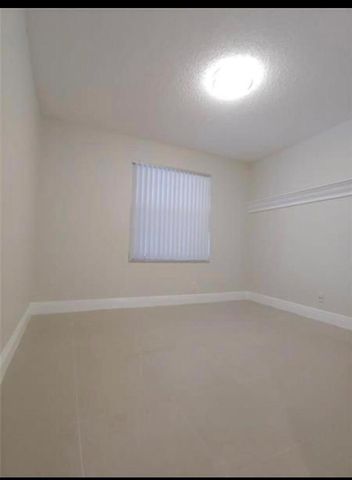 9903 Three Lakes Circle, Boca Raton, FL 33428