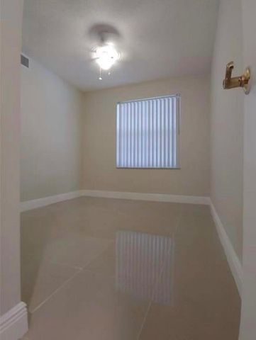 9903 Three Lakes Circle, Boca Raton, FL 33428