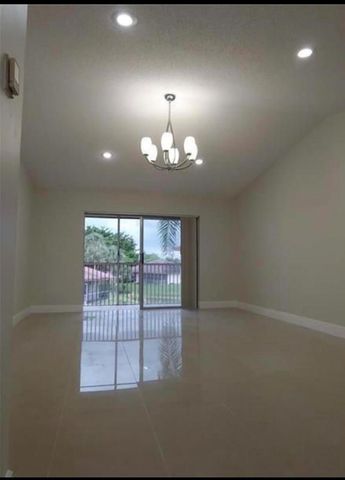 9903 Three Lakes Circle, Boca Raton, FL 33428