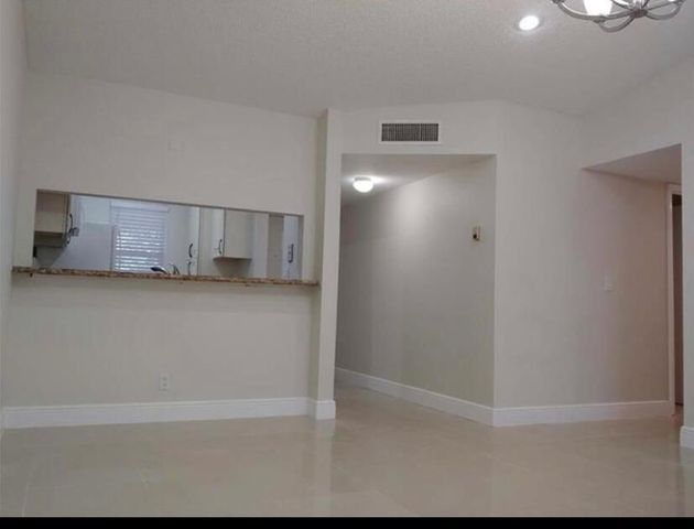 9903 Three Lakes Circle, Boca Raton, FL 33428